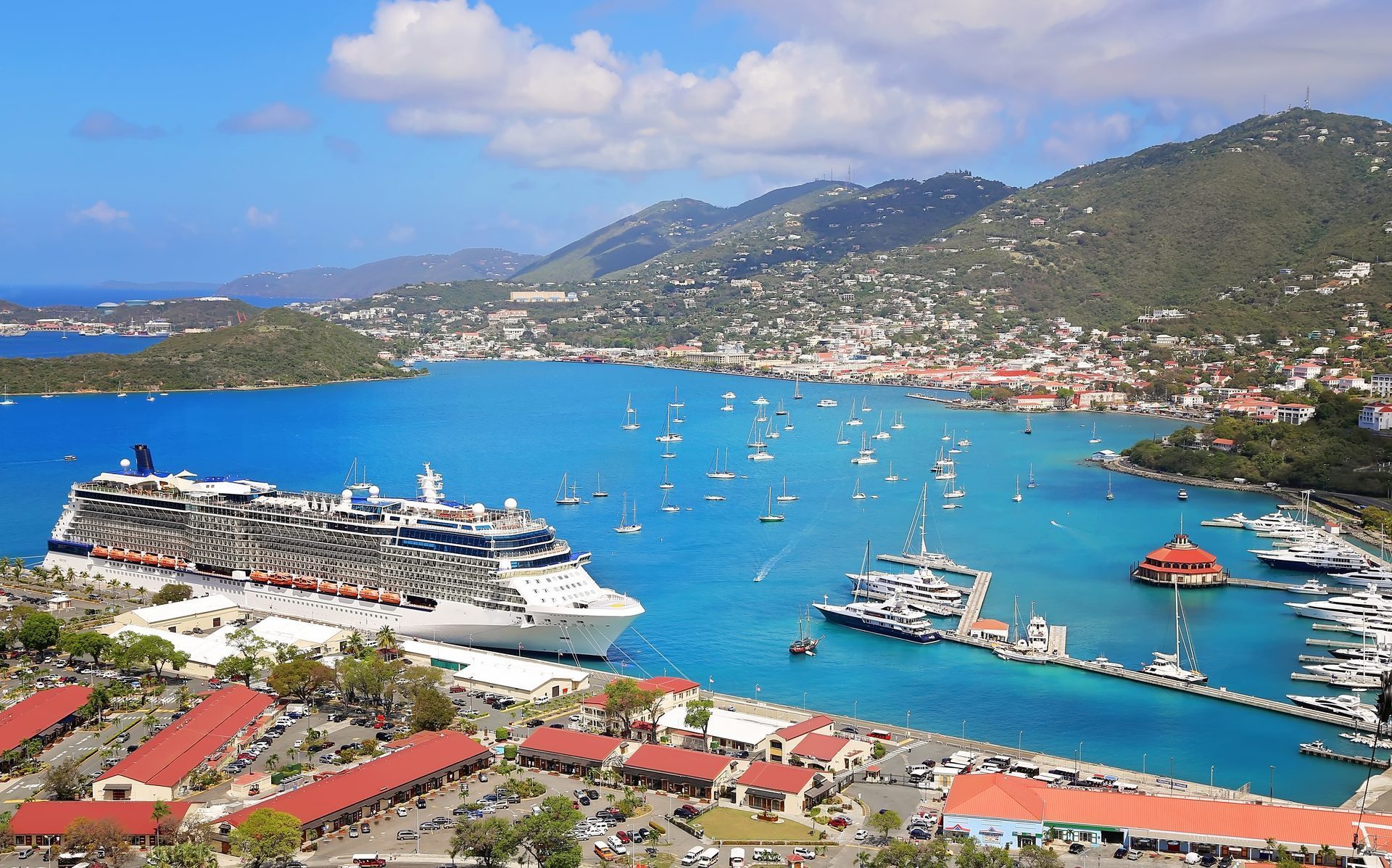 A cruise ship at anchor off a Caribbean island