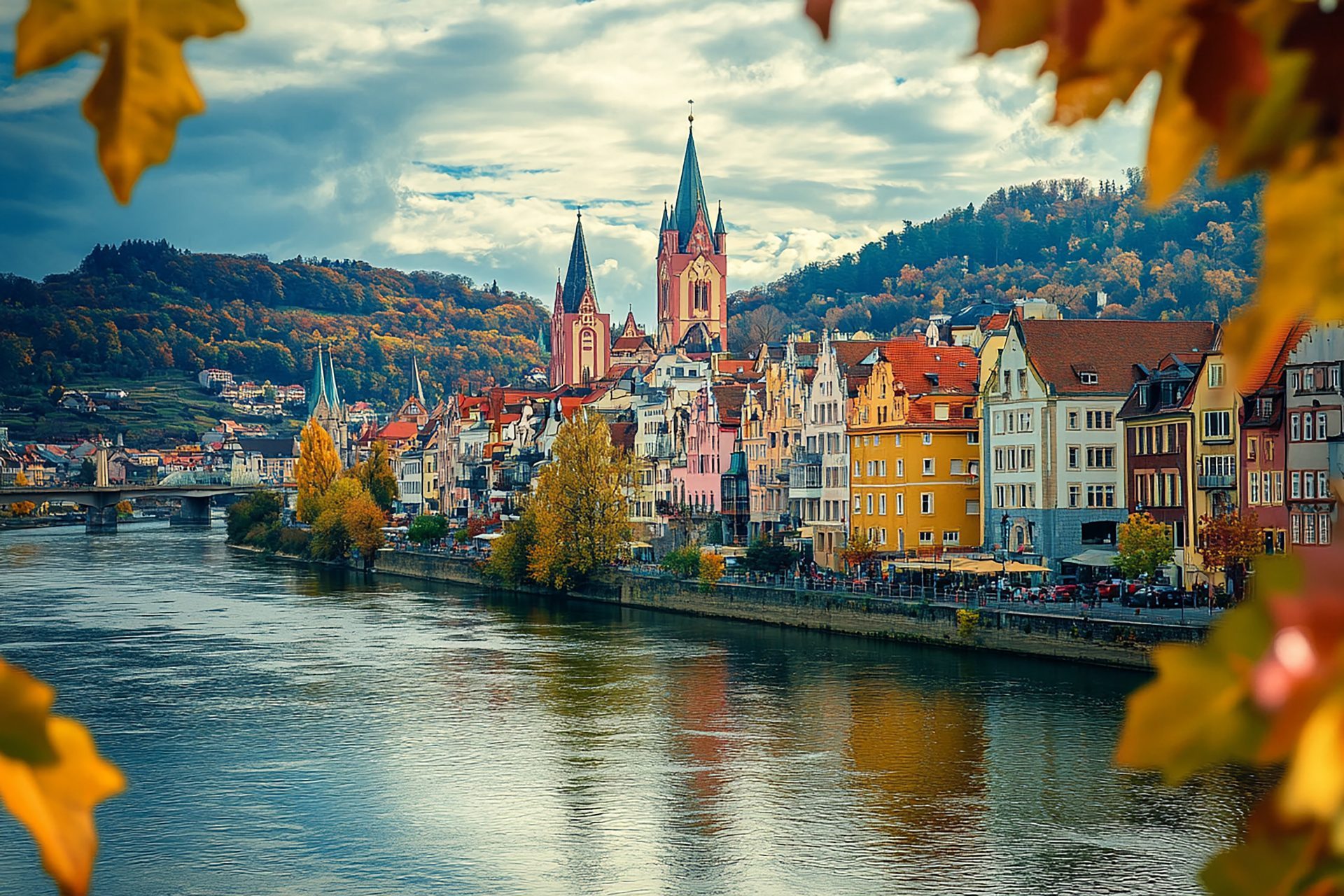 A German river town of gabled houses and church spires in autumn